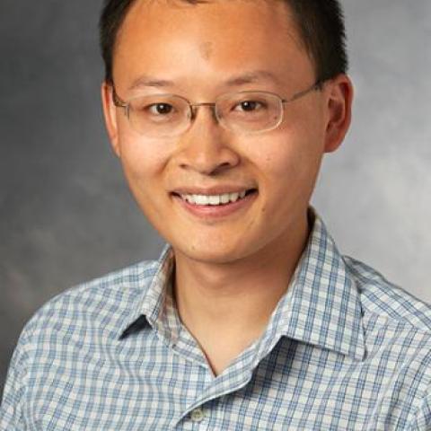 James Zou headshot against gray background