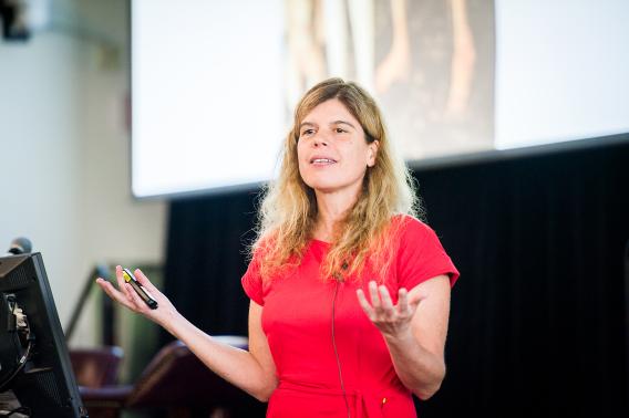 Anne Brunet presents to a large audience at the Wu Tsai Neurosciences Institute's 10th Annual Neurosciences Symposium. Photo by Ola Hopper.